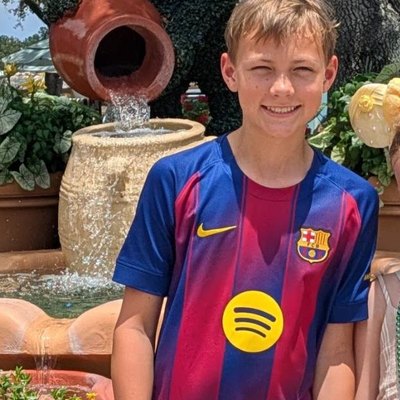 Jayden in a Barça shirt at Disney Springs